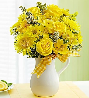 A SUNNY BRIGHT YELLOW ROSE PITCHER