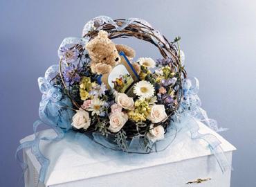 Blue and Ivory Basket Casket Spray