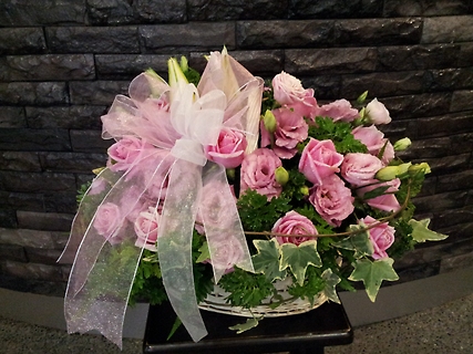 BASKET OF PINK ROSES WITH BOW