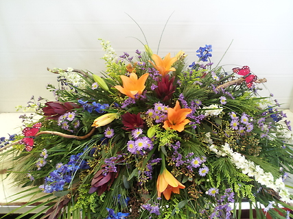 WILDFLOWER COLORFUL CASKET SPRAY