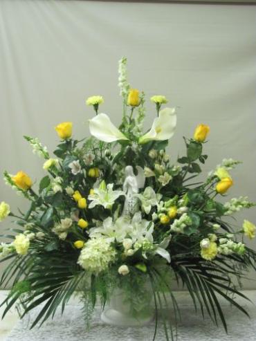 SYMPATHY ARRANGEMENT WITH YELLOW ROSES